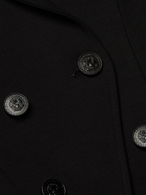 Close-up of the Emerson Ponte Blazer in black, featuring a double-breasted design with four crest-detailed buttons, fine lapel stitching, a sculpted silhouette, and crafted from super stretch ponte.