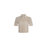 The Kirstie Jean Shirt Jacket is a beige, short-sleeve denim jacket featuring a collar, button-down front, and two chest pockets. Styled as a cropped denim jacket, it is displayed on a plain white background.