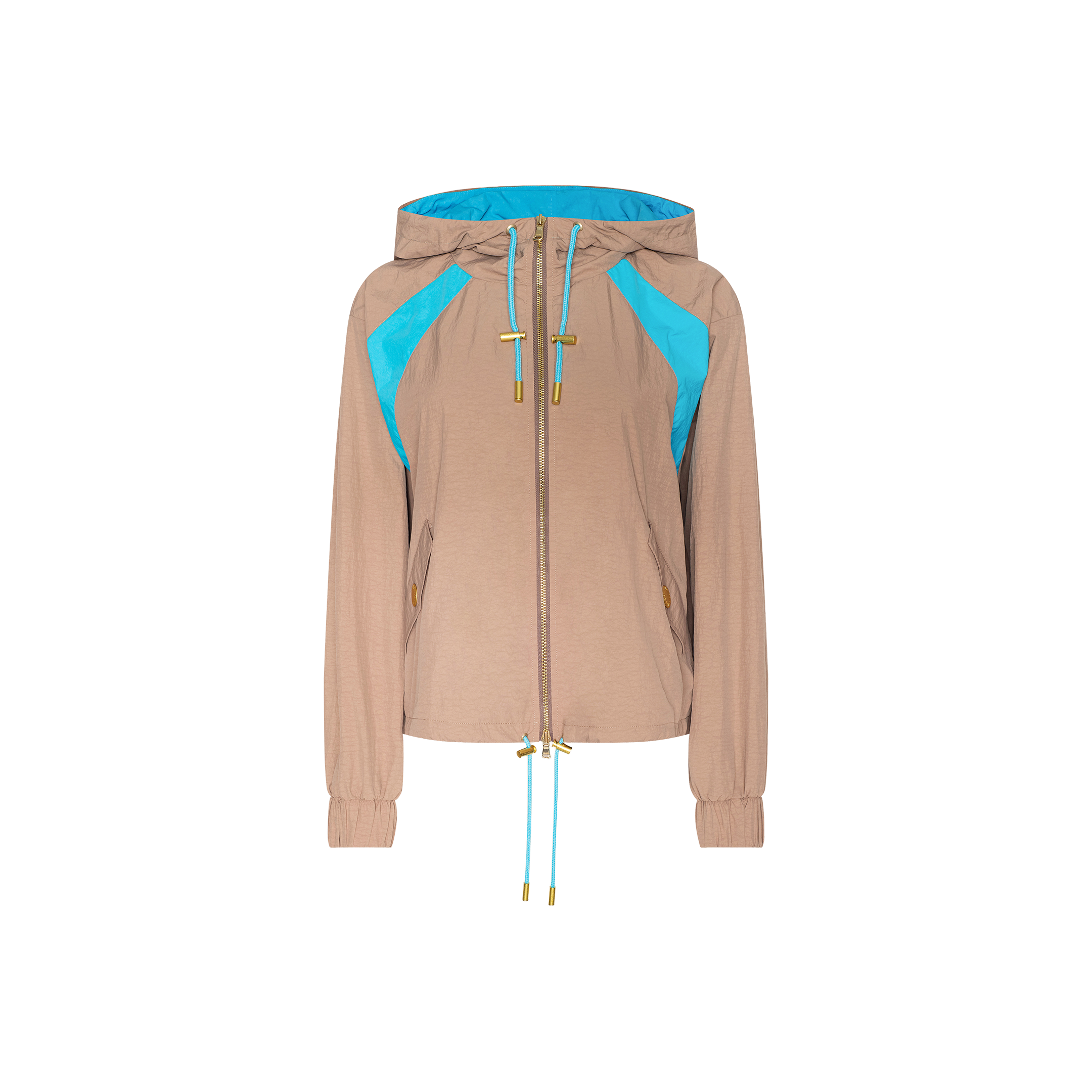 The Lark Windbreaker by L’AGENCE is a light brown jacket showcasing retro color blocking with vivid blue accents on the shoulders and inside the hood. It features a front zipper, two side pockets, elastic cuffs, and adjustable drawstrings at both the hem and hood.