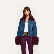 Bronson Jean Jacket in a cropped, medium-wash denim featuring a deep purple faux-fur collar and dramatic, long faux-fur trim cuffs.