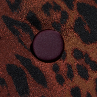 A round, dark purple button is sewn onto the Kyomi Double-Breasted Blazer, featuring a black and brown leopard jacquard pattern.