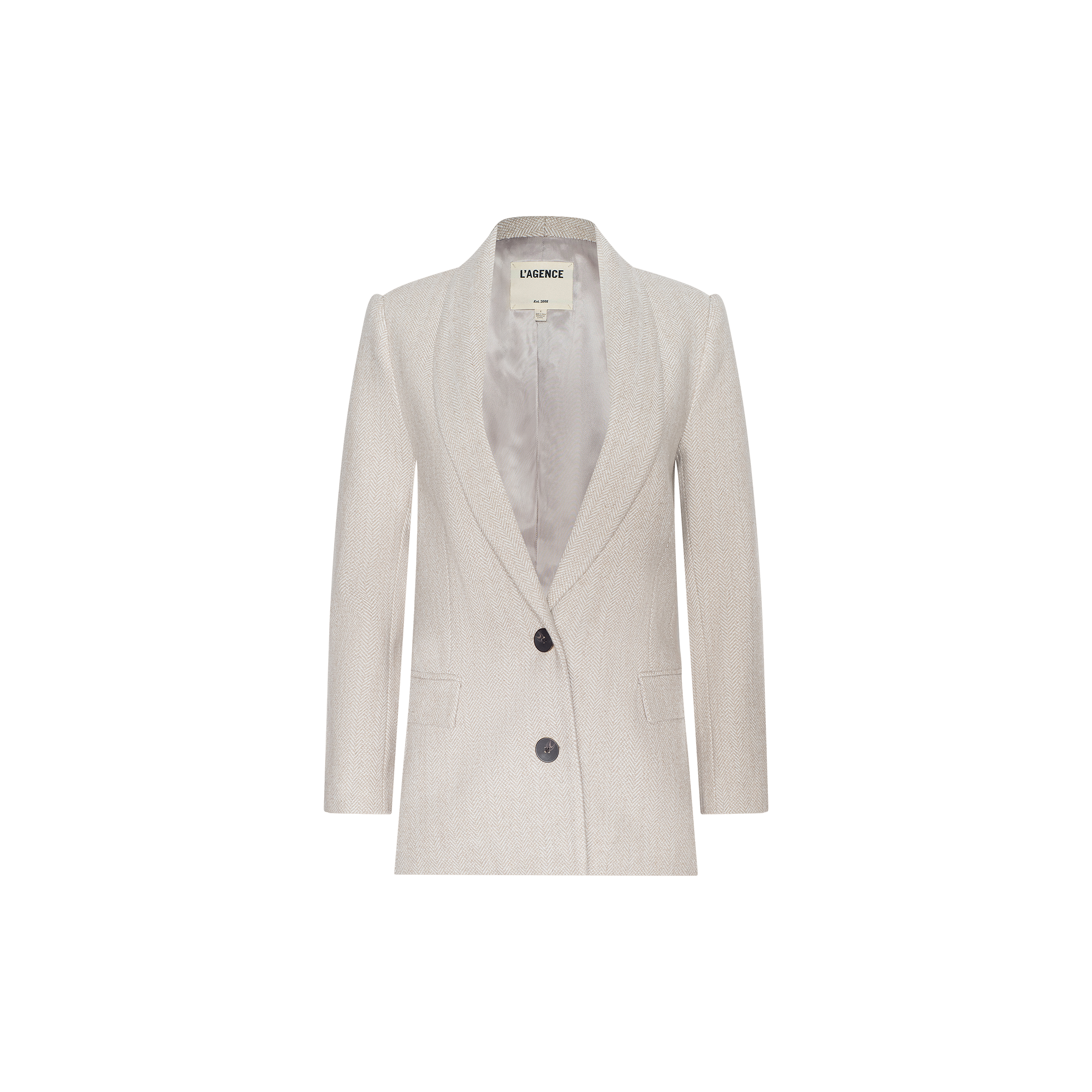 The Amelie Blazer is a light gray women’s fitted blazer crafted in herringbone tweed, featuring two black buttons, two front pockets, and a notched lapel. Displayed on a plain white background, this style draws inspiration from New York Fashion Week.