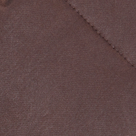 A close-up of the Glacier Shawl Puffer Jacket’s brown quilted fabric, featuring visible stitching that forms a diagonal line across the image.