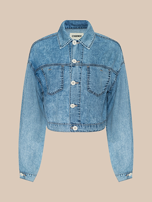 The Gaines Jean Jacket is a light blue cropped jean jacket with long sleeves, front button closure, two chest pockets, and visible seams, crafted from featherweight denim. Shown on a plain beige background.