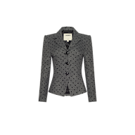 The Odile Blazer is a tailored, fitted garment in a grey polka-dot pattern featuring three black buttons and notched lapels.