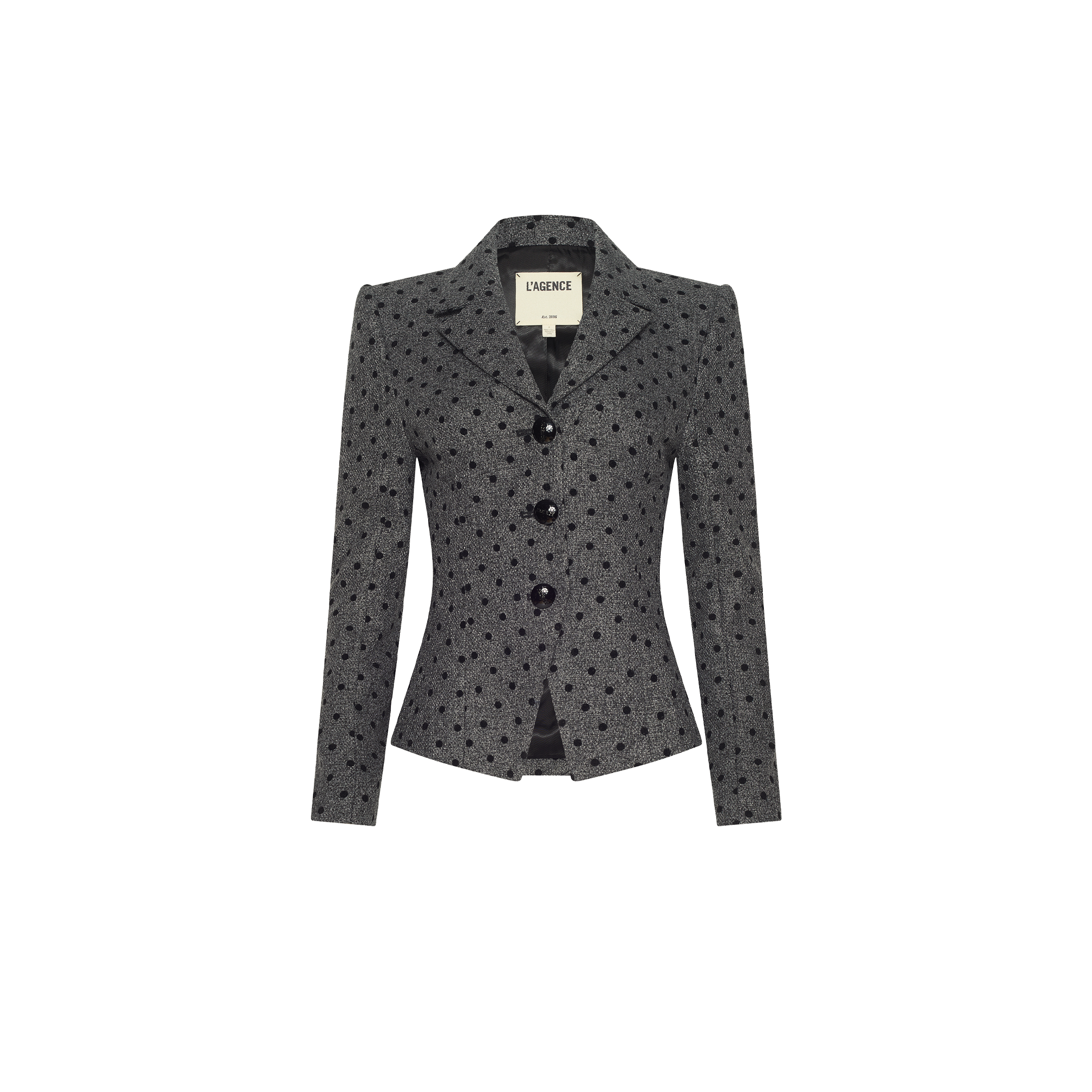 The Odile Blazer is a tailored, fitted garment in a grey polka-dot pattern featuring three black buttons and notched lapels.