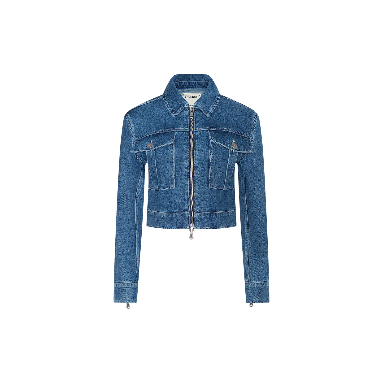 The Micah Oversized Jean Jacket features an indigo wash, cropped silhouette with long sleeves, a front zipper closure, two chest pockets, and a classic collar, displayed on a plain white background.
