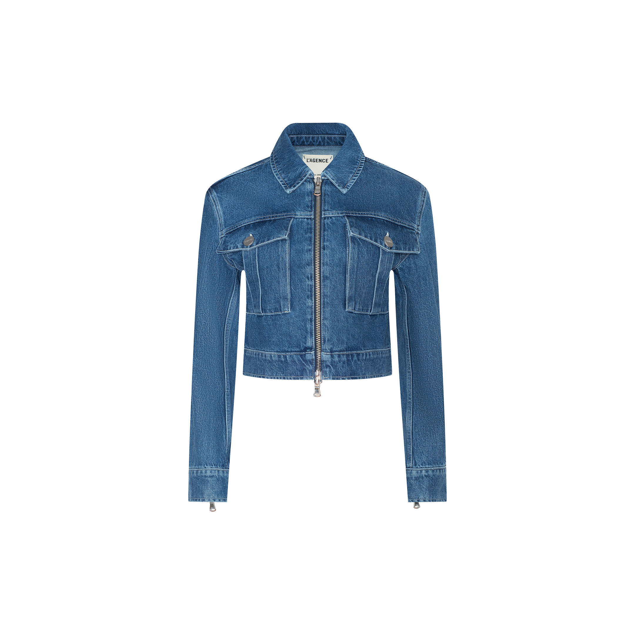 The Micah Oversized Jean Jacket features an indigo wash, cropped silhouette with long sleeves, a front zipper closure, two chest pockets, and a classic collar, displayed on a plain white background.