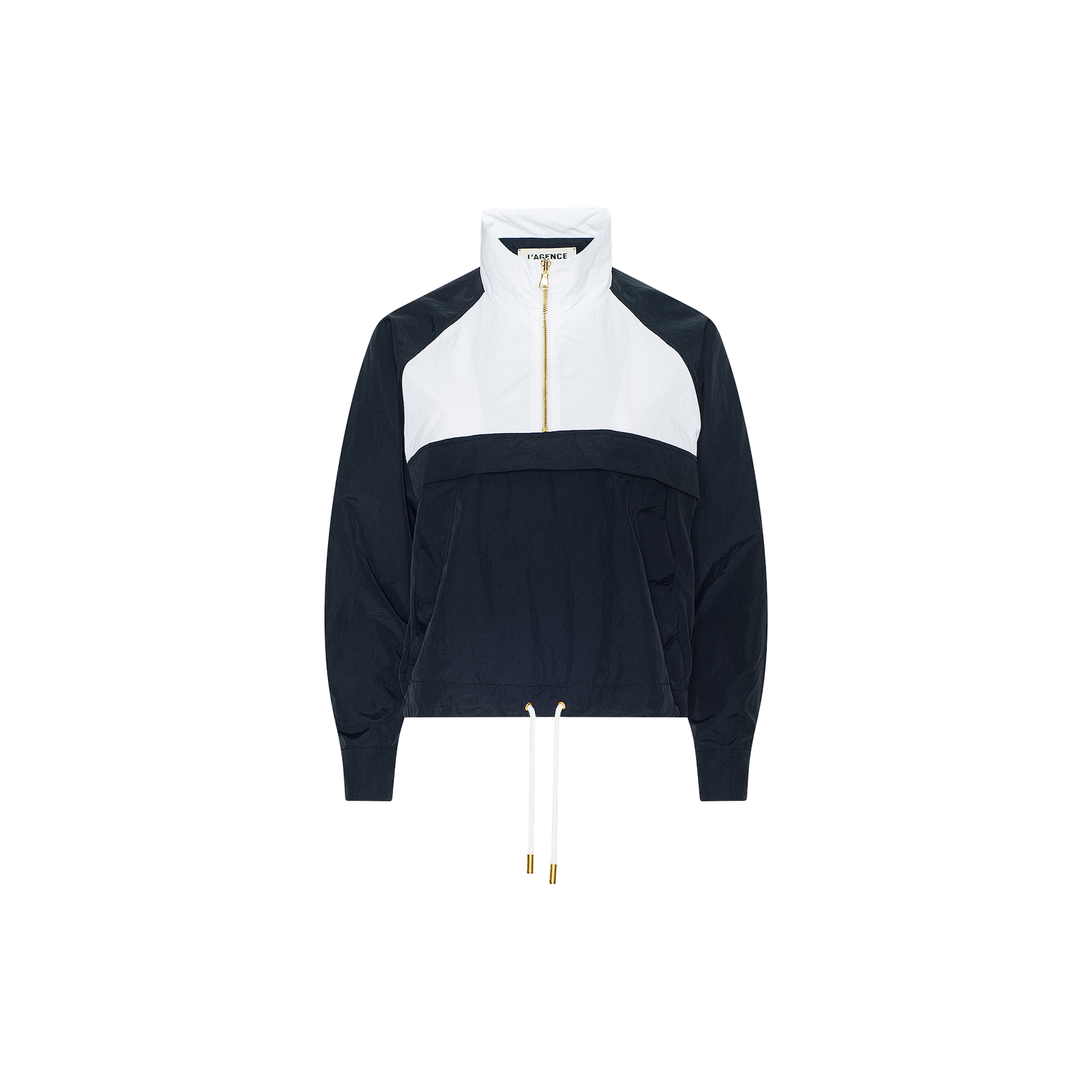 The Vex Cropped Windbreaker is a black and white long-sleeve activewear jacket featuring a front zip, high collar, and drawstring hem, shown against a plain white background. This windbreaker combines style with functionality.