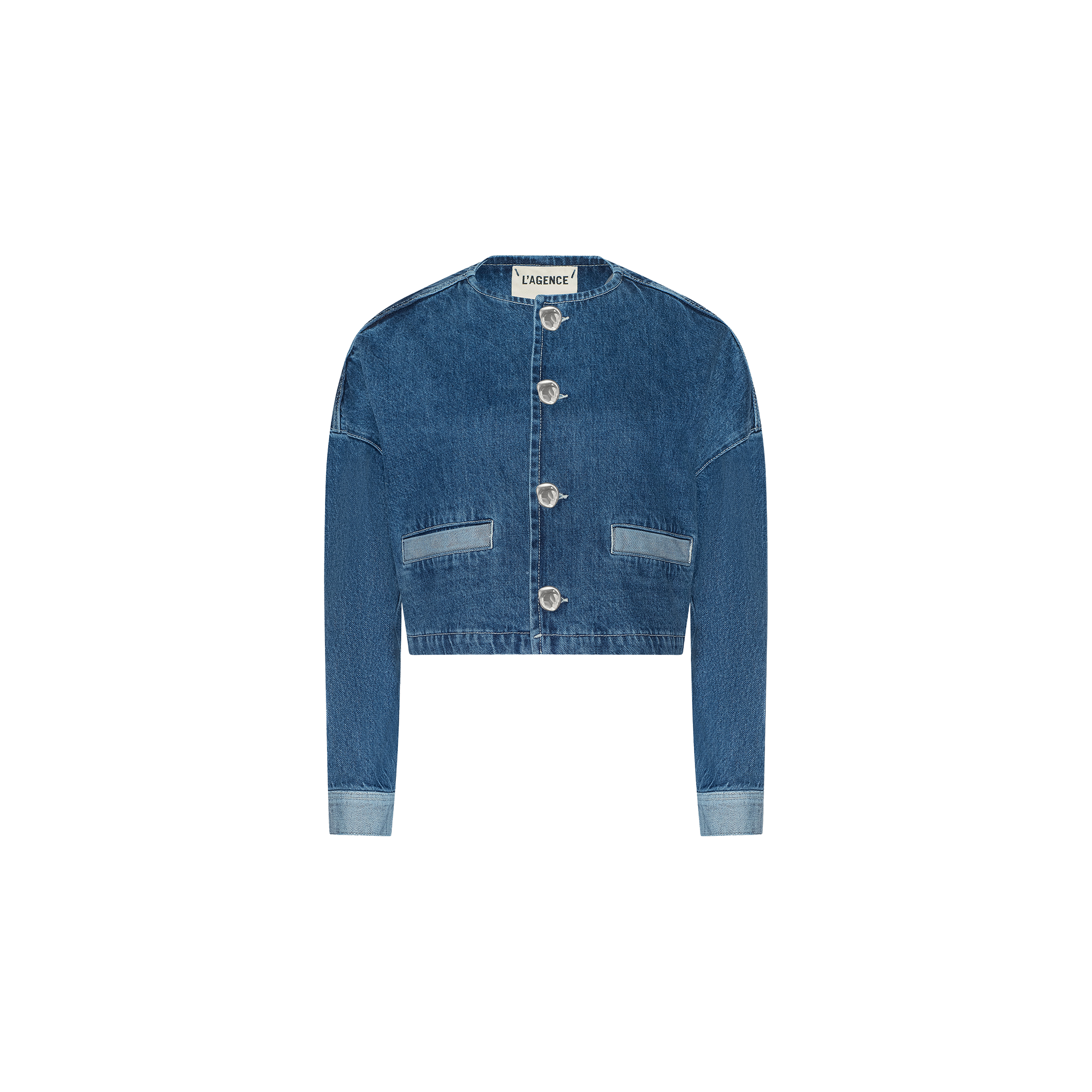 The Verona Jean Jacket is a cropped denim jacket featuring long sleeves, silver buttons, front pockets, and light blue cuffs, displayed on a plain white background.