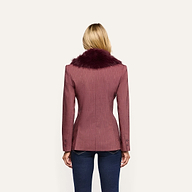 Back view of a person wearing a Sheila Blazer in mauve pinstriped fabric with a dark burgundy faux fur collar and blue jeans.