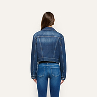 A person viewed from behind, wearing an Alessia Jean Jacket and matching jeans.