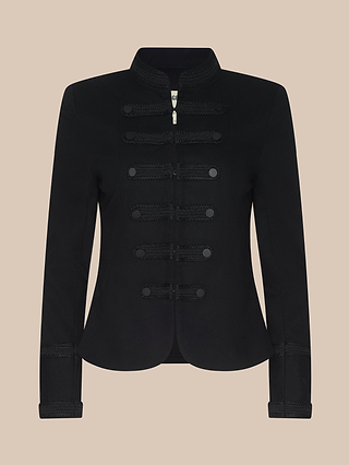 A black military-style jacket with decorative braided trim and buttons on the front, long sleeves, and a stand collar, displayed on a beige background.