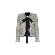 The Rosaine Jacket is a textured, light-colored tweed womens jacket with a black bow tie, black-edge detailing, and ruffled cuffs—ideal for a Spring 2027 Paris Fashion Week presentation.