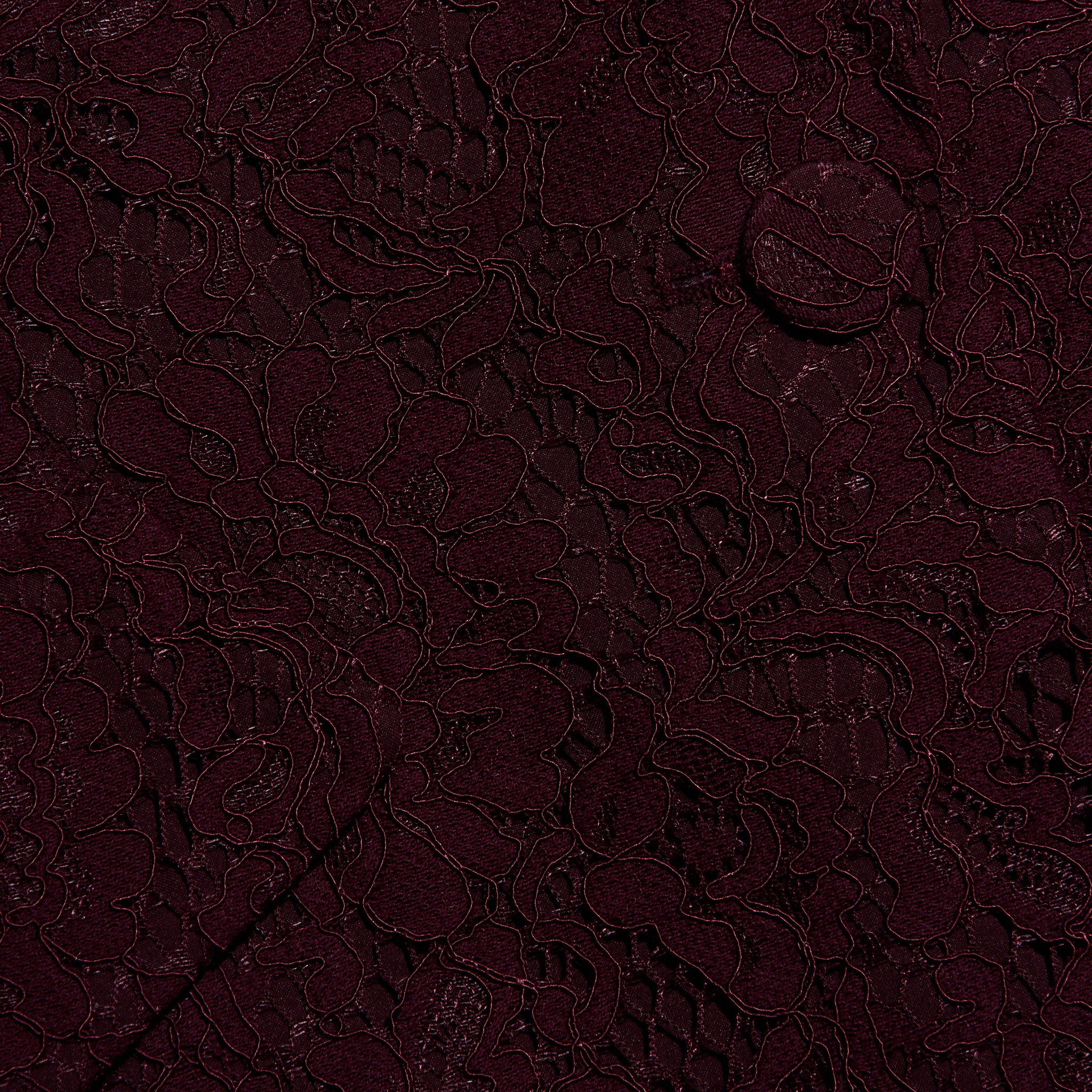 Close-up of the Chamberlain Lace Blazer in deep port red lace, featuring a classic large floral pattern and a matching button.