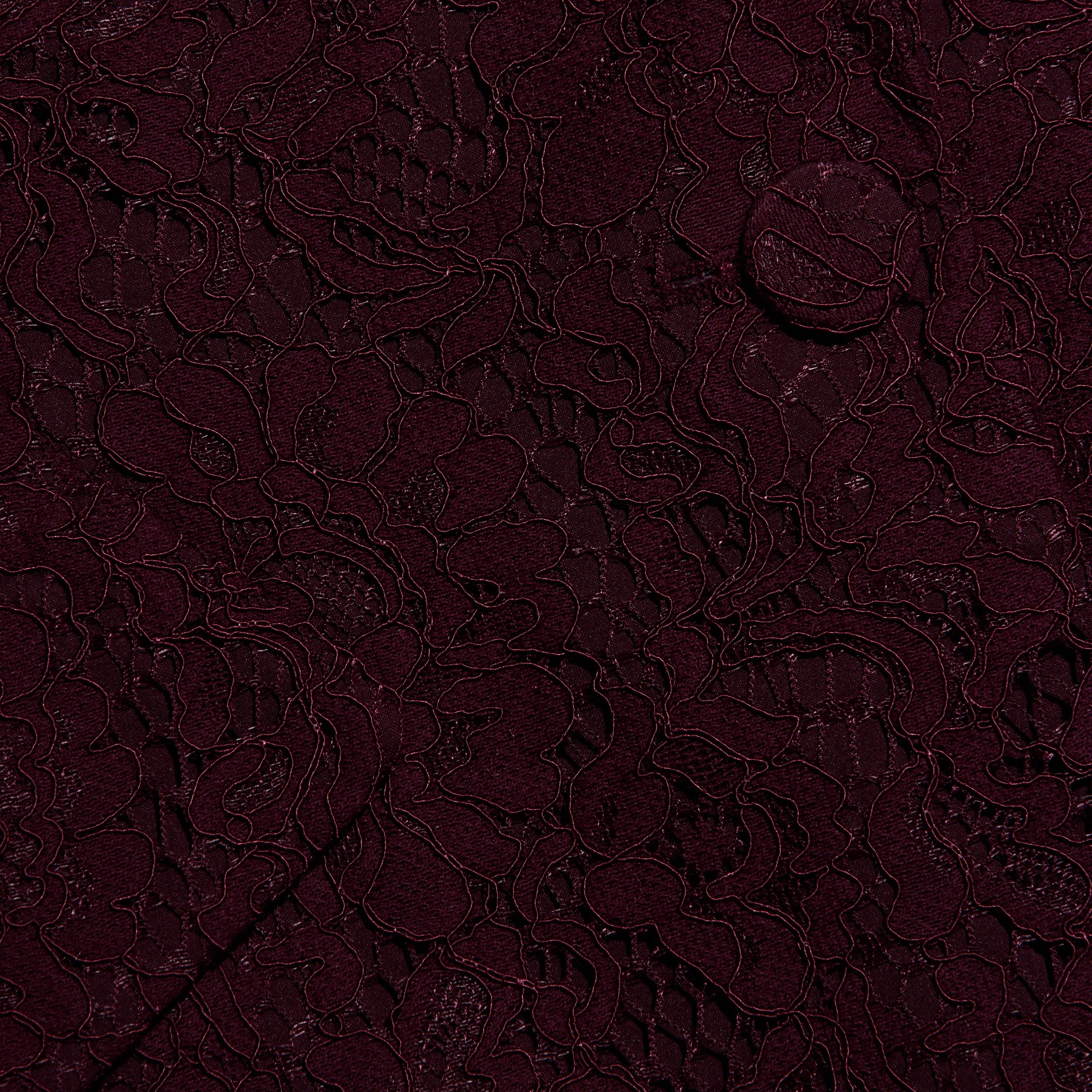 Close-up of the Chamberlain Lace Blazer in deep port red lace, featuring a classic large floral pattern and a matching button.
