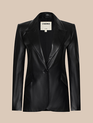 The Chamberlain Leather Blazer is a sleek black classic women’s leather blazer featuring a single button closure and notched lapels, shown against a beige background.