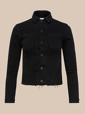 The Janelle Jean Jacket is a cropped black jacket with a collar, button front, two chest flap pockets, long sleeves, and a raw frayed hem, shown against a plain beige background.