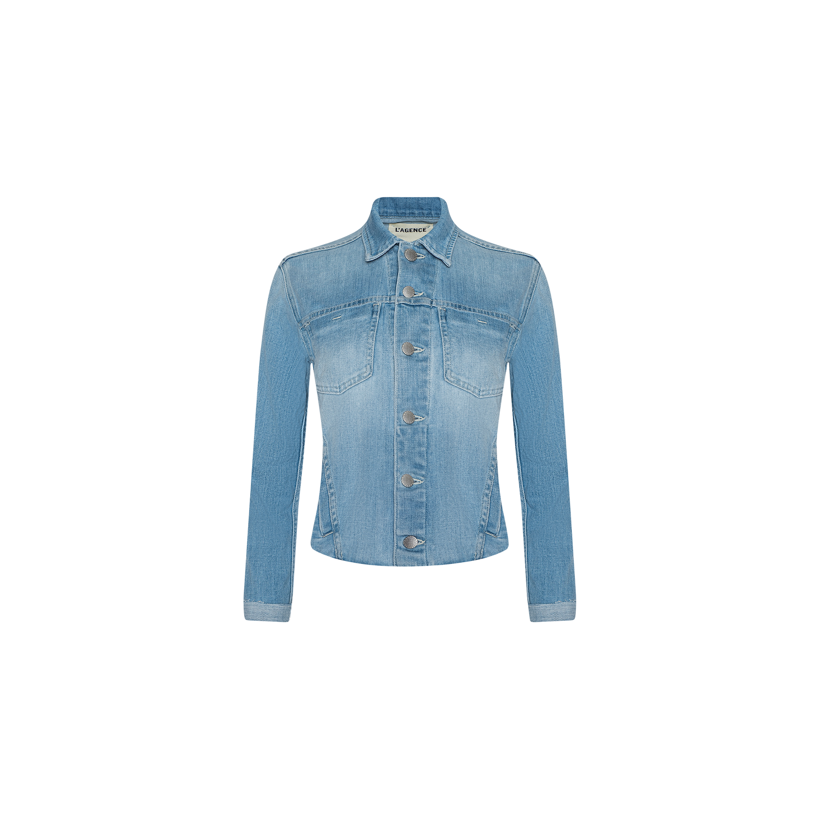 The Janelle Jean Jacket is a light blue vintage wash denim jacket with long sleeves, front button closure, and two chest pockets, displayed on a plain white background. This flattering and feminine piece features a slim fit for a timeless silhouette.