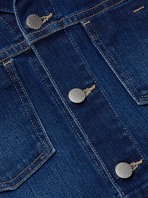Close-up of the Janelle Jean Jacket in indigo denim, showcasing silver metal buttons, yellow stitching, a pocket seam, and a flattering slim fit.
