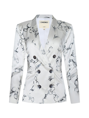 The Colin Silk Blazer is a tailored women’s blazer in white silk charmeuse with a black chain and rope print, double-breasted with black buttons. The label inside reads L’AGENCE.