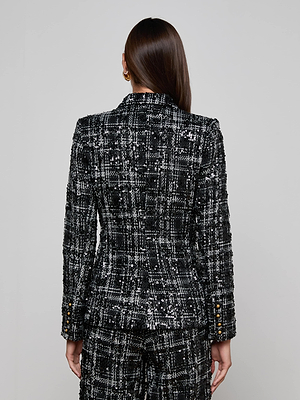 A person with straight brown hair is seen from behind wearing the L'AGENCE Colin Sequined Tweed Blazer and matching pants, set against a plain light background.