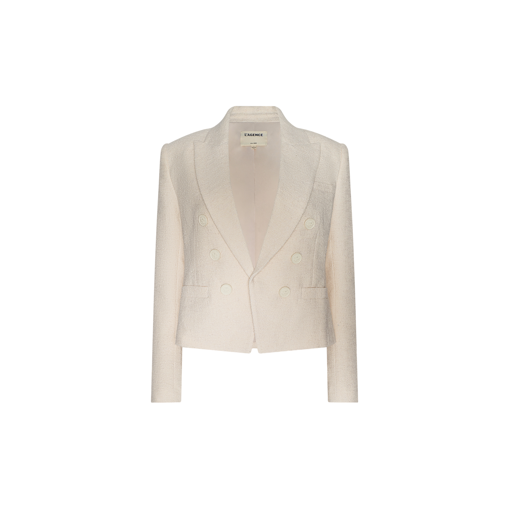 The Brooke Tweed Blazer is a cream-colored, double-breasted women’s blazer featuring long sleeves, two front pockets, and a notched lapel, shown against a plain white background.