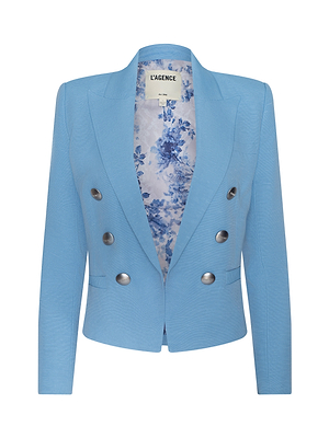 The Brooke Blazer is a light blue double-breasted piece with silver buttons, a floral blue and white lining, long sleeves, structured tailoring, and an open front. Features the LAGENCE label inside for a sophisticated touch.