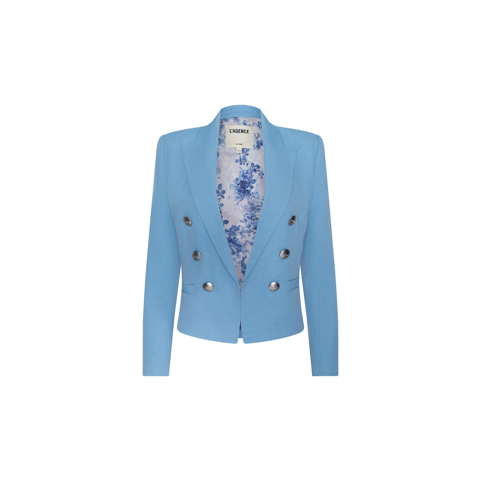 The Brooke Blazer is a light blue women’s double-breasted blazer with long sleeves, silver buttons, and a floral-patterned inner lining, crafted from lightweight ribbed fabric and displayed on a plain white background.