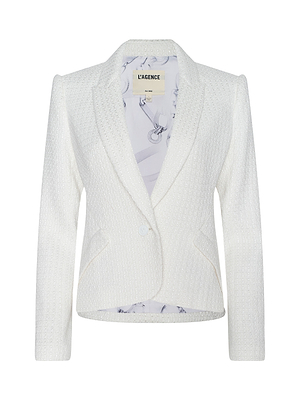 The Jennah Tweed Blazer is a white ivory textured blazer with notched lapel, single front button closure, long sleeves, subtle printed inner lining, and LAGENCE branding on the neck label.
