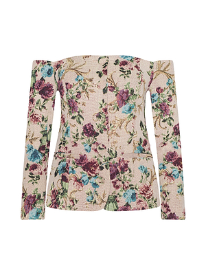 The Alice Blazer Top is a long-sleeve, off-the-shoulder suiting top featuring a fitted bodice and a floral pattern in purple, blue, green, and beige on a light background.