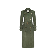The Celina Suede Trench Coat is a long, double-breasted olive green trench with a belted waist, button details, and a notched collar, displayed against a plain white background—a timeless wardrobe essential.