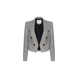 The Lila Tweed Blazer is a gray, cropped double-breasted design featuring long sleeves, black buttons, and a notched collar, shown against a plain white background.
