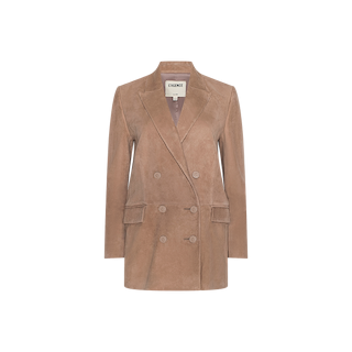The Aimee Oversized Suede Blazer is a tan double-breasted piece crafted from suede, featuring wide lapels, front flap pockets, and an interior collar label reading LEATHER. Designed with an oversized silhouette reminiscent of a classic boyfriend blazer, it is showcased on a plain white background.