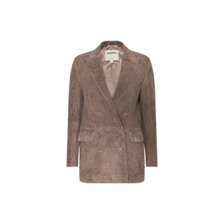 The Aimee Oversized Suede Blazer is a taupe double-breasted jacket featuring peak lapels, two front flap pockets, and a visible beige label inside the collar. This suede blazer is shown against a plain white background.
