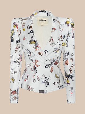The Bethany Structured Blazer is a tailored white jacket with a sculpted fit, colorful butterfly print, deep V-neck, notch lapel, long sleeves, single button closure, and an interior LAGENCE label.