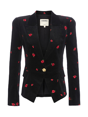 The Kaisley Velvet Blazer by L'AGENCE is a black blazer with notched lapels, front pockets, a single gold button, and red embroidered rose details—an elegant statement layer for any wardrobe.