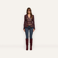 A person wearing an Ottilie Leather Blazer with gold buttons, dark wash jeans, and knee-high suede boots, showcasing a power-dressing hourglass silhouette.