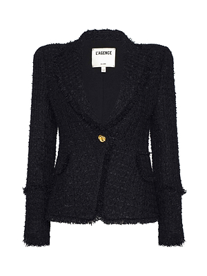 The L'AGENCE Kaisley Frayed Trim Blazer is a black textured women's tweed jacket with a single gold button, notched lapels, two front pockets, and a label inside the collar. This tailored blazer offers a structured, sophisticated fit.