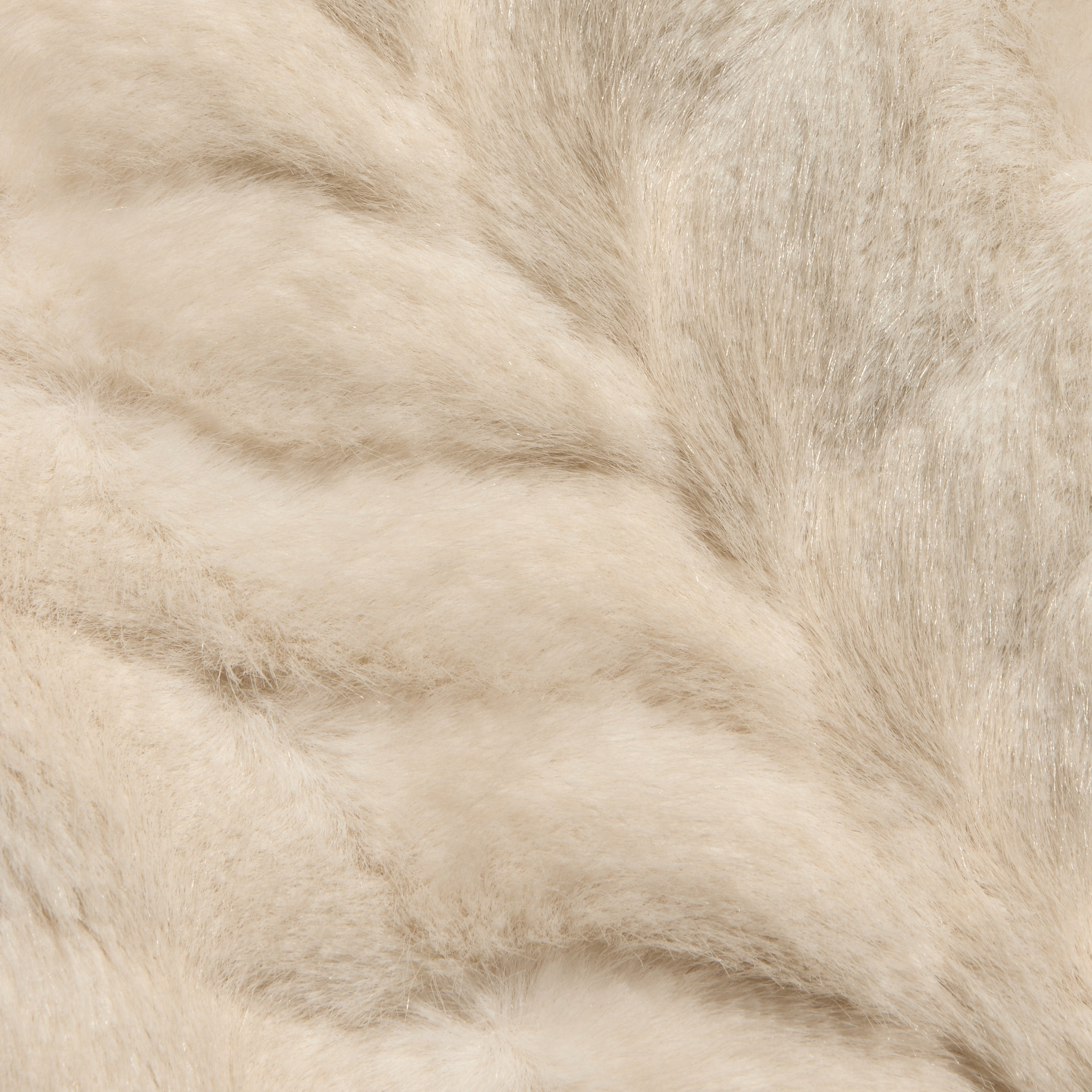 Close-up view of the soft, light beige faux fur texture from a 70s-inspired Toira Faux Fur Coat.