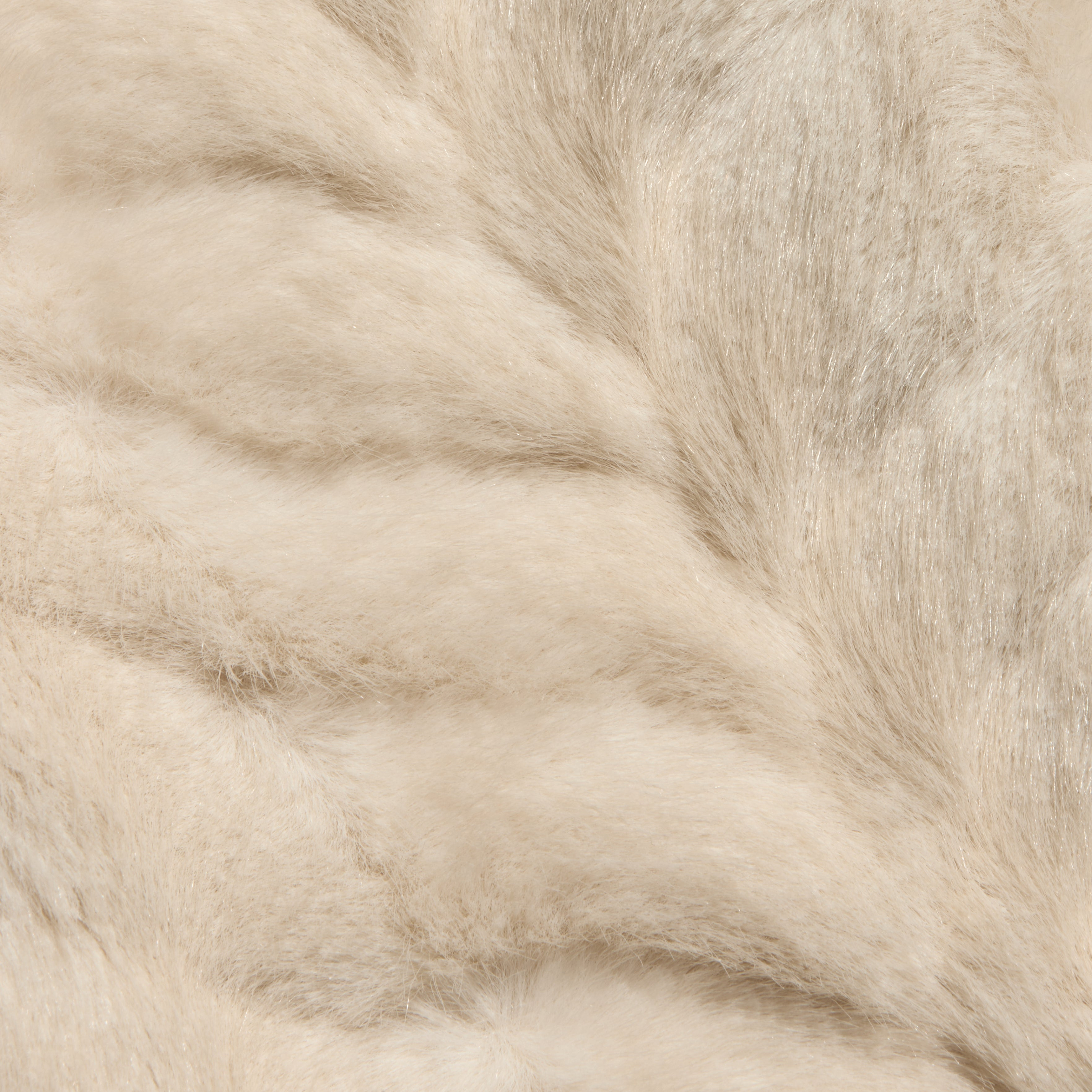 Close-up view of the soft, light beige faux fur texture from a 70s-inspired Toira Faux Fur Coat.