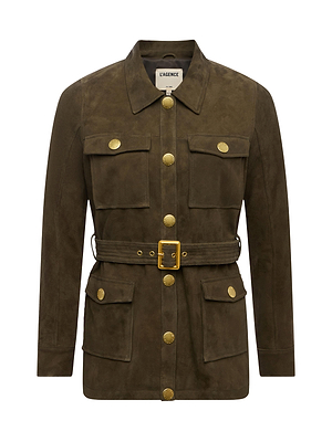 The Ishani Suede Jacket is a brown suede piece with gold buttons, front flap pockets, and a matching waist belt. It features a structured collar, buttoned cuffs, and offers a refined take on military-inspired style.