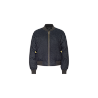 The Violeta Reversible Puffer is a navy blue bomber jacket featuring a gold zipper, ribbed cuffs, collar, and hem, as well as two gold button details on the sides, displayed against a plain white background.