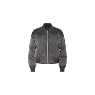The Violeta Reversible Puffer is a black quilted satin bomber jacket featuring a front zipper, ribbed cuffs and hem, and two side pockets, shown against a white background.