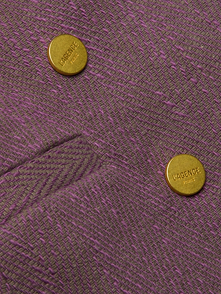 Close-up of the Kyomi Double-Breasted Blazer in purple herringbone textured fabric, featuring two gold buttons engraved with the word LAGENCE.