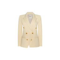 The Kyomi Double-Breasted Blazer, featuring a cream hue, gold buttons, notched lapels, and flap pockets, is showcased against a plain white background.