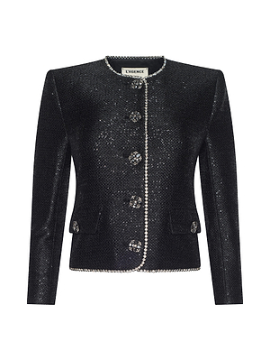 The Zell Sequined Tweed Jacket by L'AGENCE features black sequined tweed, jeweled buttons, pearl trim, a round neckline, two front pockets, and the brand label inside the collar.