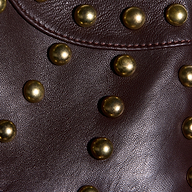 Fia Leather Jacket in chocolate brown lambskin, detailed with rows of round, gold-tone metal studs.