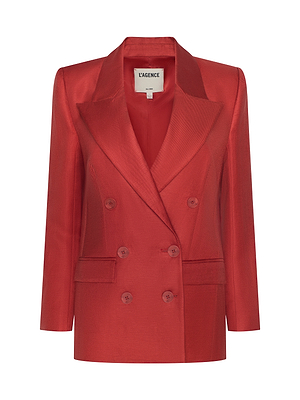 The Cambrie Oversized Blazer is a women’s double-breasted, bright red linen blazer with notch lapels, four front buttons, and two pockets—a bold L’AGENCE statement piece for any wardrobe.