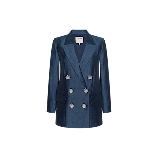 The Cambrie Oversized Blazer, featuring a double-breasted design in dark blue with long sleeves, six silver buttons, and two front pockets, is displayed against a plain white background.
